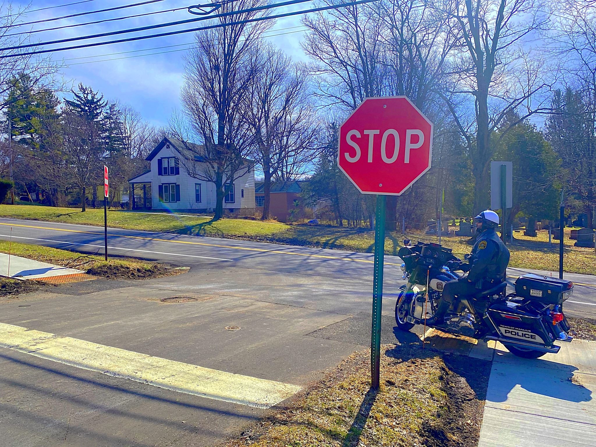 officer motorcycle stop sign
